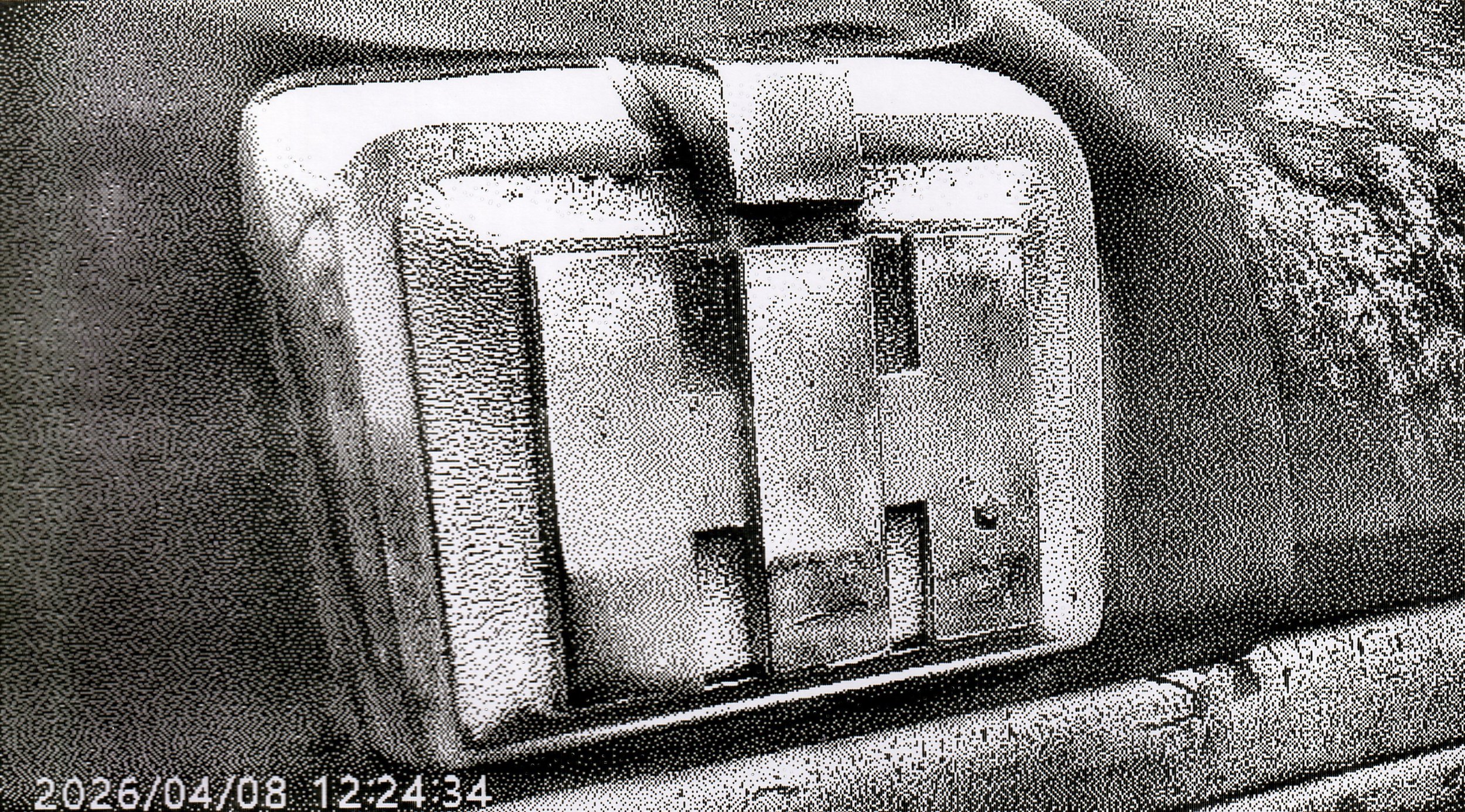 IH badge up close, The Old House, Sunnyridge Farm, Alberta, 2026-04-08